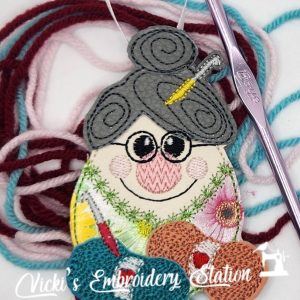 Crocheting Lady Magnet Ornament